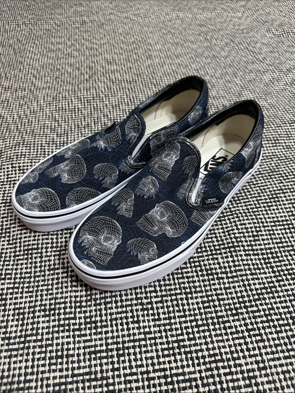 Vans Men’s Slip-On Sneakers — Black with White Skull Grid